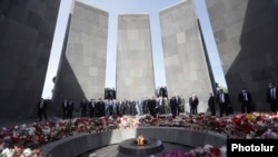 Senior officials in Armenia visit attend a memorial in Yerevan on April 24, marking the country's Armenian Genocide Remembrance Day.