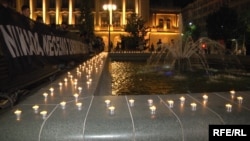 Members of the Youth Initiative for Human Rights lit candles in Andric's park in downtown Belgrade to pay tribute to the victims of genocide in Srebrenica