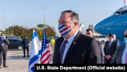 U.S. Secretary of State Michael Pompeo wearing a face mask arrives In Israel, May 13, 2020