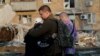 Survivors Of Russia's Attack On Kyiv Sort Through Aftermath2 GRAB
