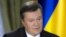 Ukrainian President Viktor Yanukovych speaks during a meeting with journalists in Kyiv on November 26.