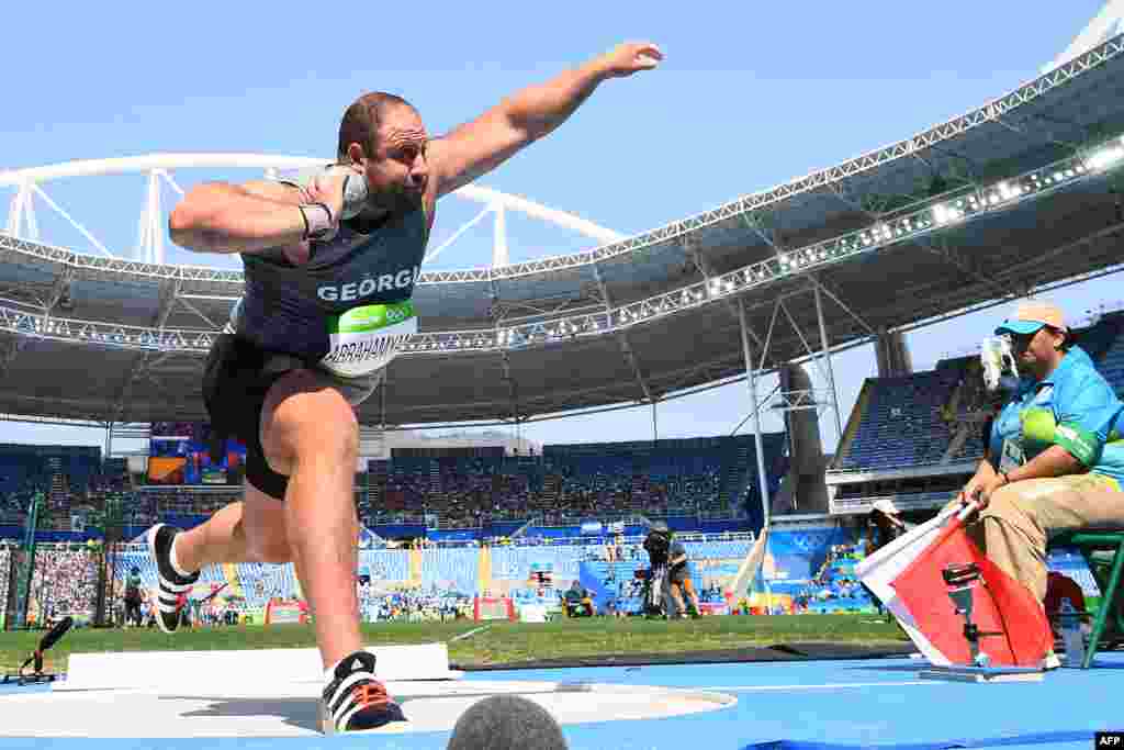 Georgia&#39;s Benik Abrahamyan competes in the men&#39;s shot put qualifying round.