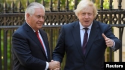 British Foreign Secretary Boris Johnson (right) meets U.S. Secretary of State Rex Tillerson at the former's official residence in London on May 26.