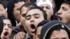 Demonstranti izvikuju parole protiv predsjednika, Port Said, februar 2013.