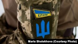 За версією російського слідства, Куртамет нібито передав 500 гривень товаришеві, який, як він дізнався згодом, служить у батальйоні «Крим»