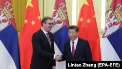 Kinë, Beijing: Presidenti i Serbisë, Alaksandar Vuçiq dhe Presidenti i Kinës Xi Jinping gjatë një takimi më 18 shtator, 2018. 