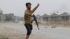 A fighter loyal to Libya's UN-backed government during a clash with forces loyal to Khalifa Haftar on the outskirts of Tripoli.