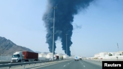 ფოტო არქივიდან. არაბთა გაერთიანებული საამიროების ქალაქ ფუჯეირაში, ნავთობტერმინალის ტერიტორიაზე გაჩენილი ხანძარი, რომელიც ადგილობრივი ხელისუფლების ცნობით, მოგერიებული ირანული დრონების ნამსხვრევებმა გამოიწვია 2026 წლის 14 მარტს