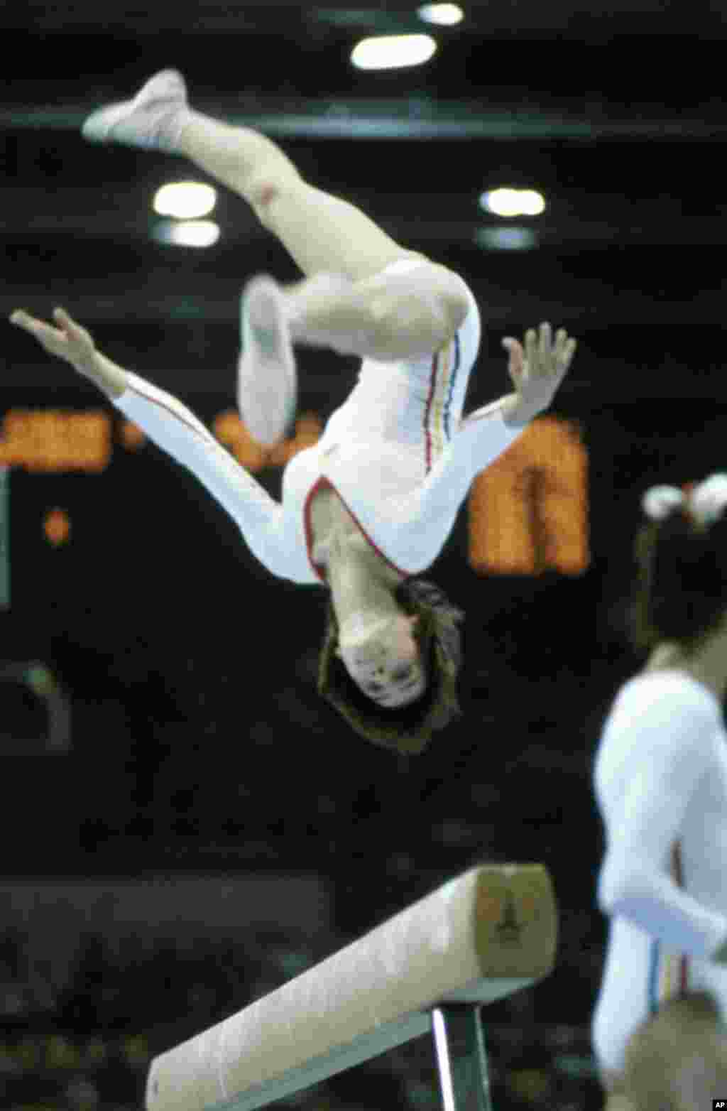 Romania&rsquo;s Nadia Comaneci&nbsp;flipping toward another in her string of perfect 10s, this time on the balance beam. Her first perfect 10s were awarded at the Olympics in Montreal in 1976. She was the first gymnast ever to receive a perfect score.