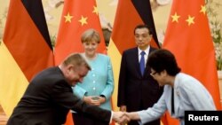 Angela Merkel i Li Kećing u Pekingu