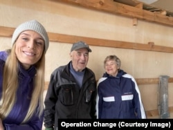 Minnie Regland (left) with a couple who had donated their fishing nets on Aland
