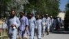 Some of the 100 Taliban prisoners released from the Bagram prison north of Kabul on May 25.&nbsp;The release came amid a three-day cease-fire for the Eid al-Fitr holiday that ends the Muslim holy fasting month of Ramadan. Afghan officials called on the Taliban to extend the cease-fire.