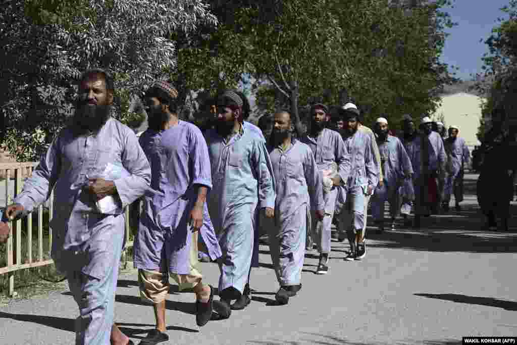 Some of the 100 Taliban prisoners released from the Bagram prison north of Kabul on May 25.&nbsp;The release came amid a three-day cease-fire for the Eid al-Fitr holiday that ends the Muslim holy fasting month of Ramadan. Afghan officials called on the Taliban to extend the cease-fire.