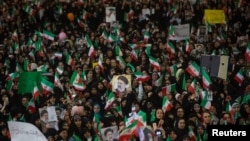 Supporters of Iranian Presidential candidate Ebrahim Raeisi gather during a campaign rally at the Mosalla mosque in Tehran, May 16, 2017