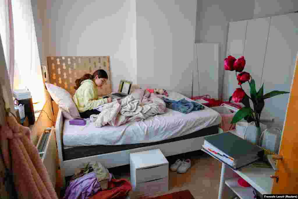 A schoolgirl studies in her room in Brussels during the coronavirus lockdown.&nbsp; 
