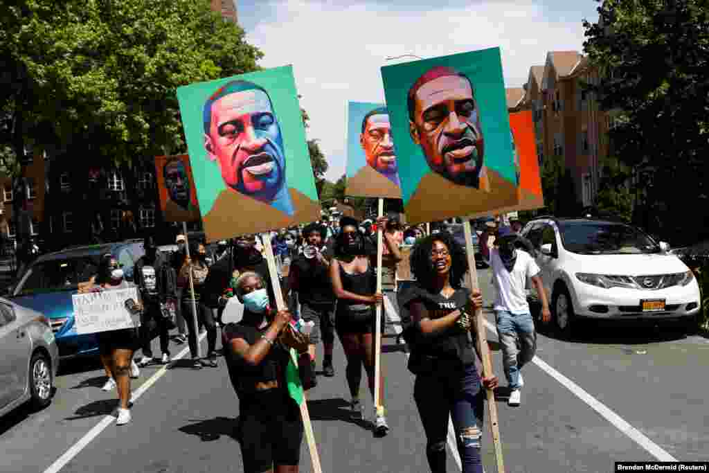 Demonstrators march during a protest against racial inequality in the aftermath of the death in Minneapolis police custody of George Floyd, in Brooklyn, New York, U.S., June 16, 2020.