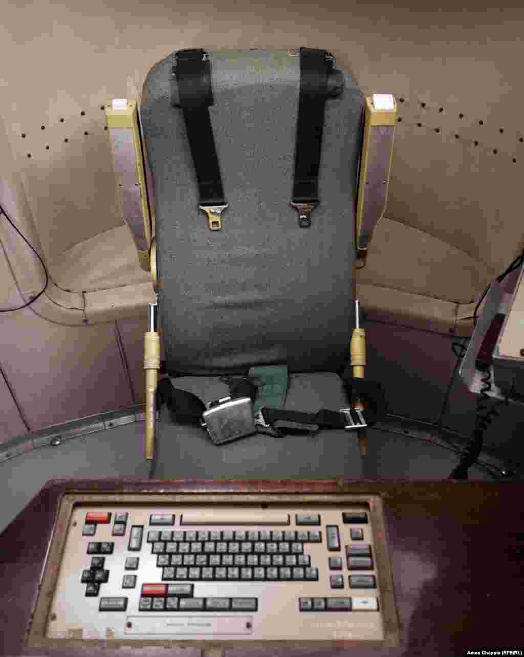 Deep underground, commanders on duty spent six hours in front of their keyboard, strapped into their seats in case an enemy missile struck. The men were not permitted to eat or drink while in this seat.