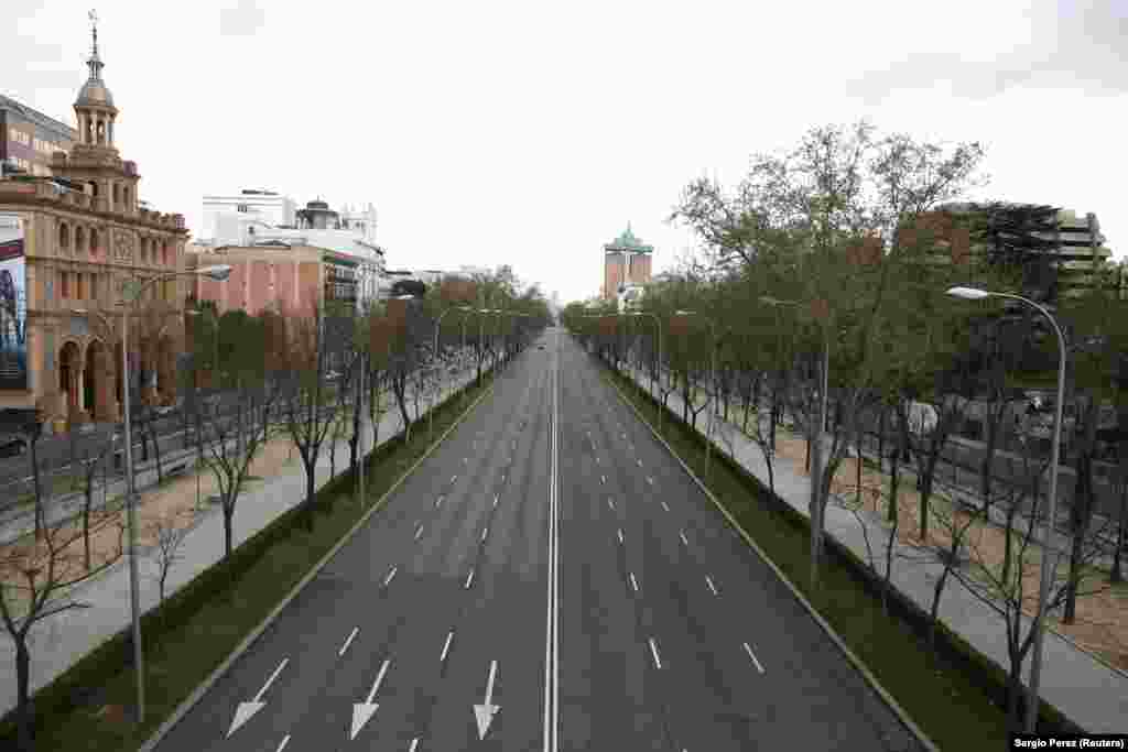 Spain - FILE PHOTO: General view shows an almost deserted Paseo de la Castellana street during the coronavirus disease (COVID-19) outbreak in Madrid, 24Mar2020