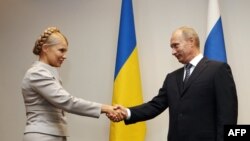 Russian Prime Minister Vladimir Putin and his Ukrainian counterpart, Yulia Tymoshenko meeting in Poland in September.