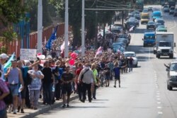 Калёна завадчанаў на вуліцы Ваўпшасава ў Менску