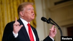 U.S. President Donald Trump addresses a meeting of the National Space Council in the East Room of the White House in Washington on June 18.