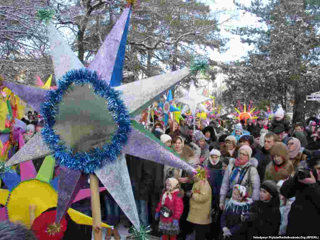 A procession of Christmas stars in Simferopol, Ukraine.