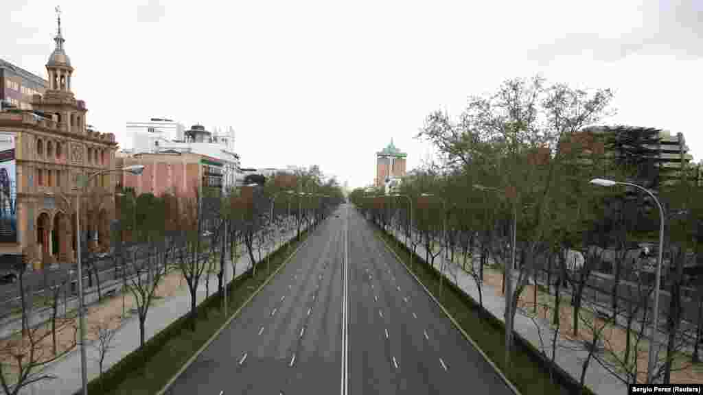 Spain - FILE PHOTO: General view shows an almost deserted Paseo de la Castellana street during the coronavirus disease (COVID-19) outbreak in Madrid, 24Mar2020