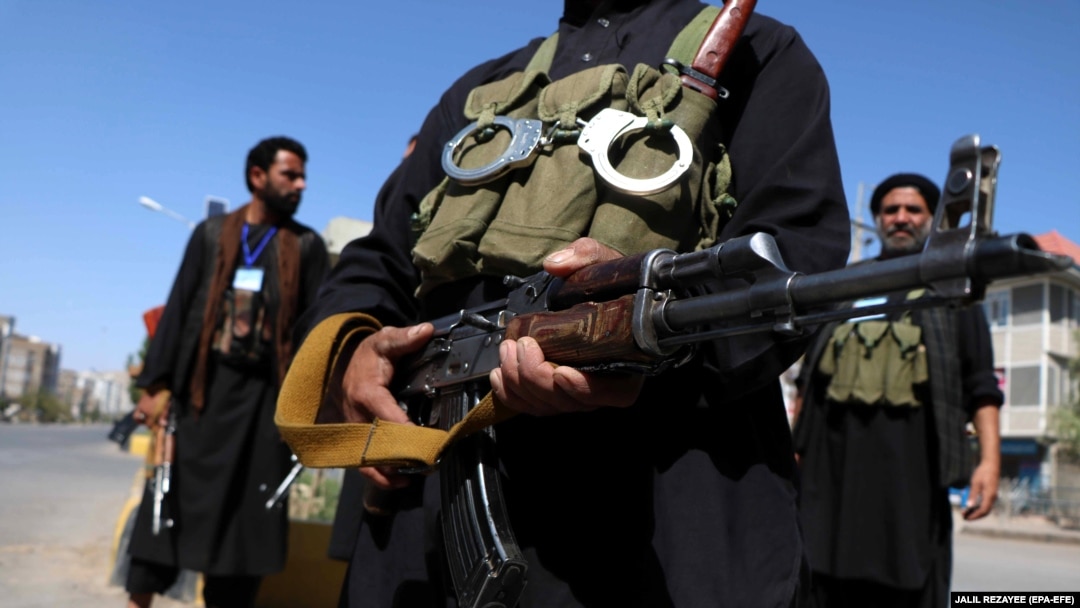 Private security guards secure the venue of a mourning procession ahead of Ashura, in Herat, western Afghanistan, on September 19.