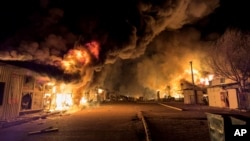 A market burns after a Russian strike in Mykolayiv, Ukraine, on October 15.