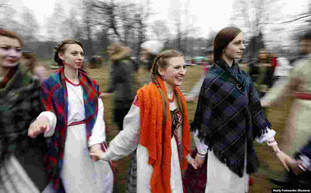 Young women swirl through traditional spring celebrations in Viazynka. But Starr believes Belarusians may be underestimating themselves on the emotion front. “When I tell my Belarusian friends that they are friendly and outgoing and warm, they are always surprised and think it’s not true. I don’t think they accurately see themselves.”