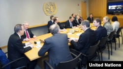 UN Secretary-General Ban Ki-moon (far left) meets with the Middle East Diplomatic Quartet, including several members participating via video link, in New York on March 12.