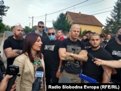 Members of Levijatan, including Bihali (center with arms folded), at an anti-migrant protest in Obrenovac, in the Belgrade district, in May 2020.