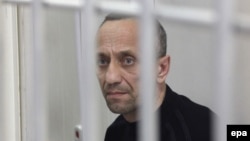 Mikhail Popkov attends a verdict announcement at the Irkutsk regional court in the Siberian city of Irkutsk in January 2015.