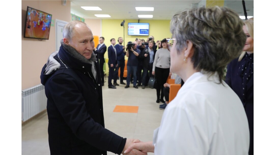 Putin visits a local children's clinic in the town of Usman in the Lipetsk region on January 22.