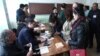 Armenia - Voters prepare to cast ballots at a polling station in Hrazdan, 17Apr2016.