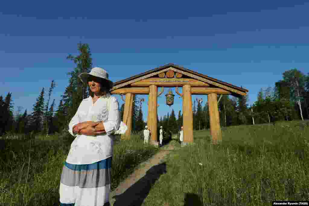 A gateway to the sacred mountain where Vissarion lives near Petropavlovka Vissarionites cross themselves when passing through this gate in a similar fashion to Orthodox Christians, but add a swooping circle at the end of the movement reportedly to symbolize the unity of all religions. 