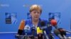 GRAB-Merkel Defends Germany's NATO Record