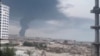 A plume of smoke rises on July 30 after reported strikes on Iran's Qeshm Island the previous night. 