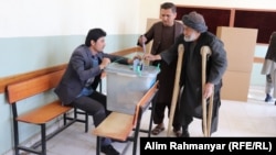 An Afghan man casting his vote in Jawzjan Province. 