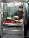 No Meat And Forced To Sell Belongings: Iranians Face Deepening Economic Crisis