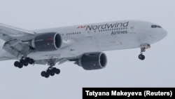Ресейдің Nordwind Airlines әуе компаниясына тиесілі Boeing 777 ұшағы. Внуково әуежайы, Мәскеу, 31 қаңтар, 2019 жыл.