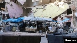 Empty vegetable stalls are pictured in Aleppo's rebel-controlled Bustan al-Qasr neighborhood due to a siege by Syrian pro-government forces on August 5.