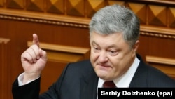 Ukrainian President Petro Poroshenko delivers his annual address to lawmakers at the Ukrainian parliament in Kyiv on September 7.