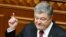 Ukrainian President Petro Poroshenko delivers his annual address to lawmakers at the Ukrainian parliament in Kyiv on September 7.