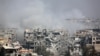 Последствия бомбардировки в пригороде Дамаска Восточной Гуте