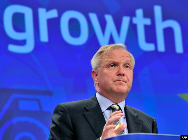 Olli Rehn, gjatë një konference për media në Bruksel, në kohën kur ishte komisionar për Ekonomi. 2 qershor, 2014.