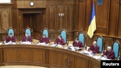 Judges of Ukraine's Constitutional Court attend a hearing on constitutional reform in Kyiv.