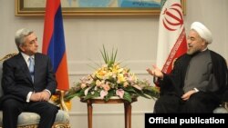 Iran - President Hassan Rouhani (R) meets with his visiting Armenian counterpart Serzh Sarkisian in Tehran, 5Aug2013.