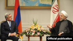 Iran - President Hassan Rohani (R) meets with his visiting Armenian counterpart Serzh Sarkisian in Tehran, 5Aug2013.