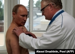 Putin was not shy about showing this doctor's consultation after he reportedly injured his shoulder during judo practice in 2011. But he would not allow cameras to record his alleged coronavirus vaccination on March 23.